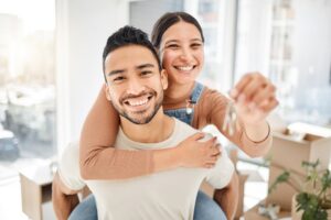 This is the start we always wanted. Portrait of a young couple holding the keys to their new house